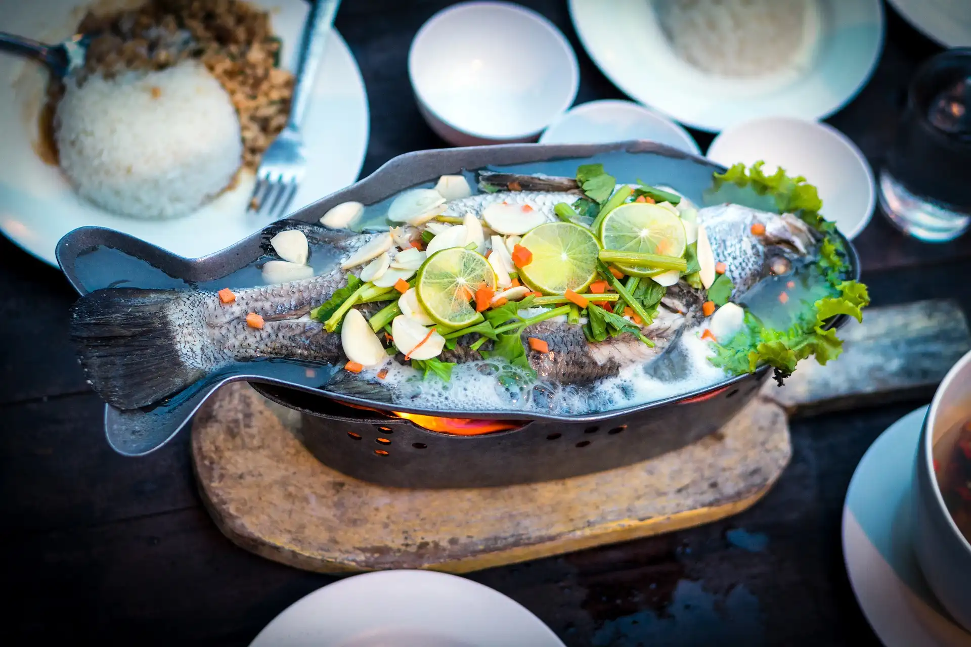 Thai food with fish in the plate ready to serve